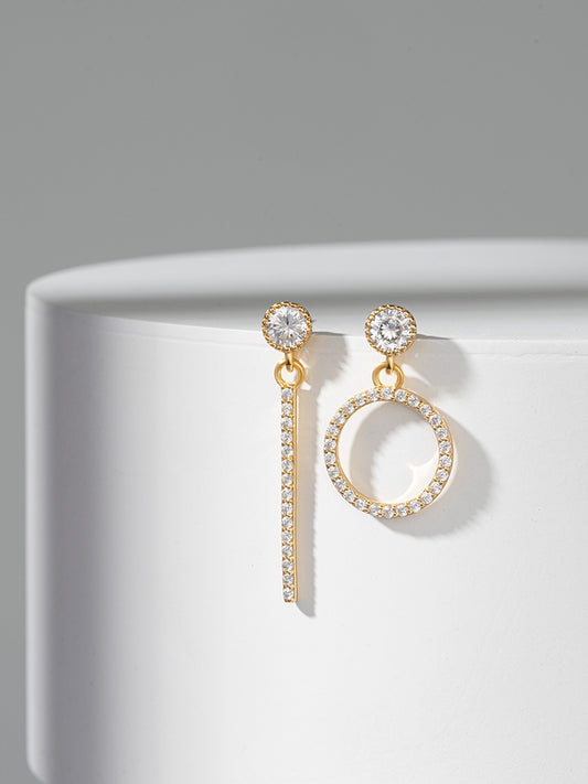 “Asymmetrical gold plated silver stud earrings”
“Modern mismatched stud earrings for women”
“Minimalist gold stud earrings made of sterling silver”
“Fashion earrings with asymmetrical gold design”
“925 silver stud earrings with gold plating”