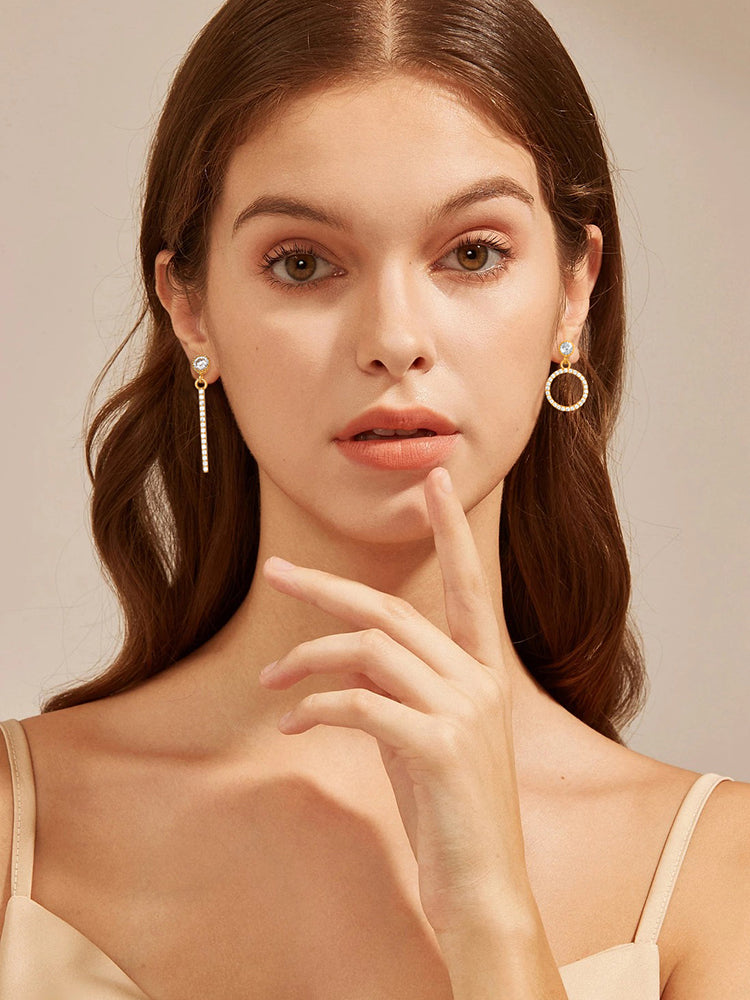 “Asymmetrical gold plated silver stud earrings”
“Modern mismatched stud earrings for women”
“Minimalist gold stud earrings made of sterling silver”
“Fashion earrings with asymmetrical gold design”
“925 silver stud earrings with gold plating”