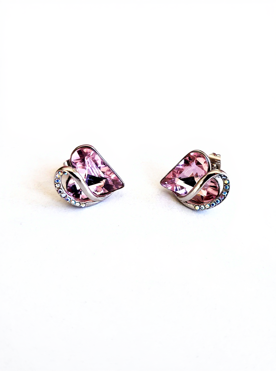 Radiant Romance: Silver Earrings with Pink Heart Shapes