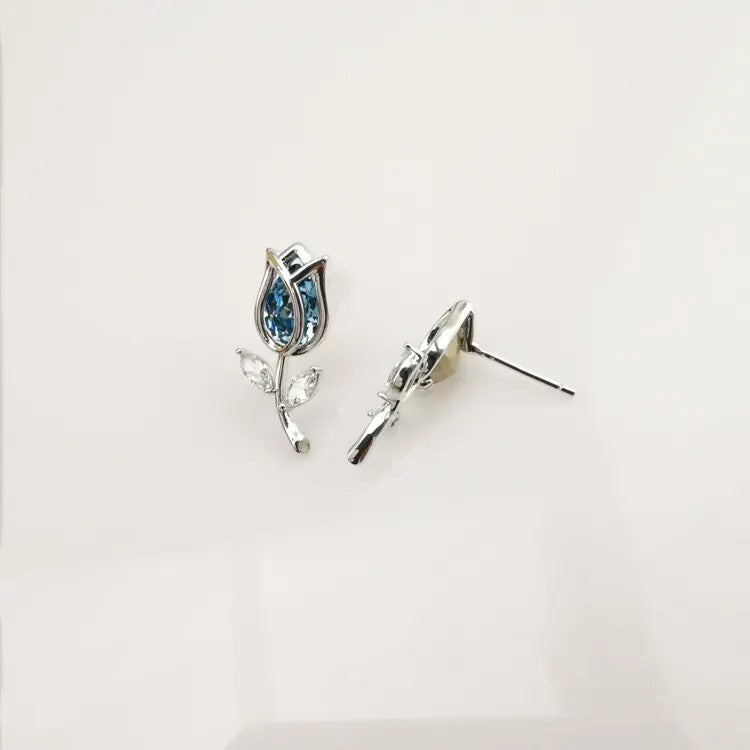 Silver Tulip and blue stone stud earrings