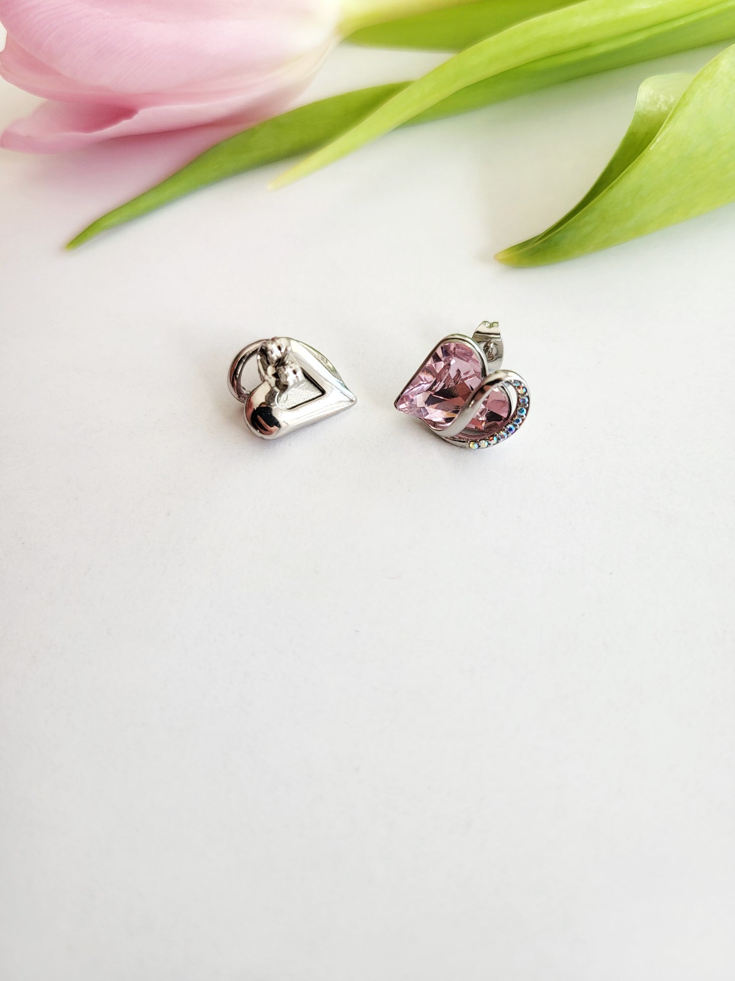 Radiant Romance: Silver Earrings with Pink Heart Shapes