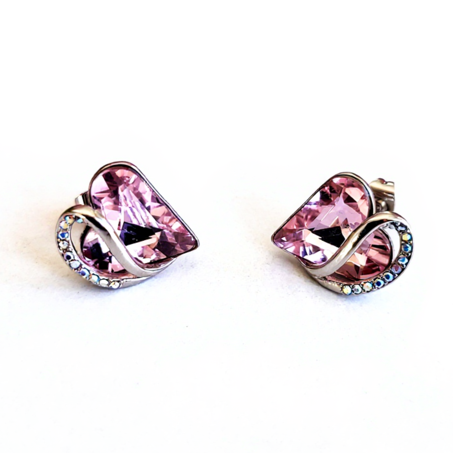 Radiant Romance: Silver Earrings with Pink Heart Shapes